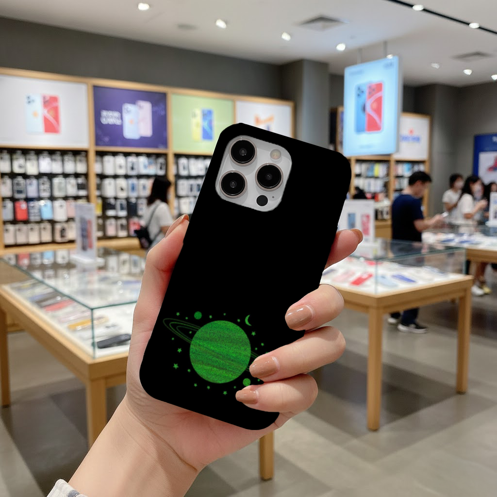 Green planets on a black background. iPhone 16 Pro Max Case
