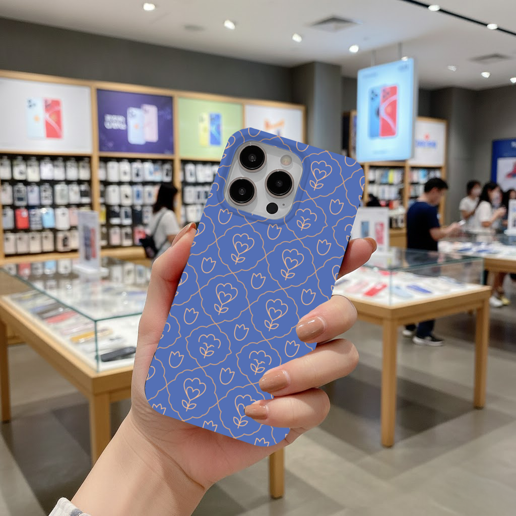 Orange Linear Floral Pattern on Blue iPhone 16 Pro Max Case